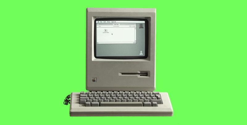   녹색 배경에 빈티지 개인용 컴퓨터
